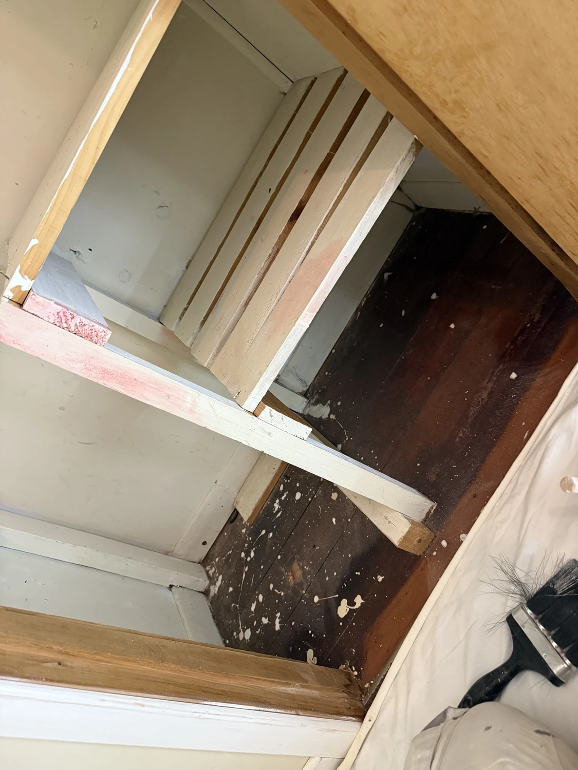 During stage prep and painting work underway on interior surfaces